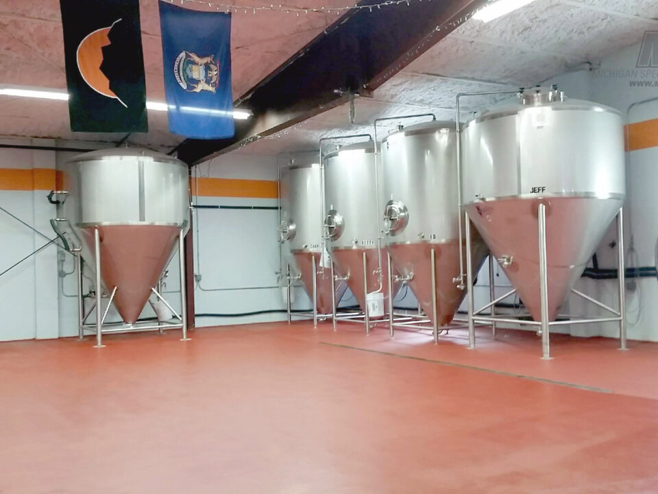 Industrial floor coating inside processing facility serving Michigan, Ohio, and Indiana